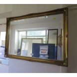 An octagonal wall mirror in a giltwood frame 64cm square, a burr walnut framed dressing mirror,