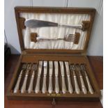 A cased set of fish knives and forks