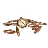 A ladies 9 carat gold watch together with a pair of 9 carat gold cufflinks