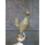 A bronze cockerel hatpin/needle holder, 9.5cm high