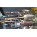 Three Georgian silver serving spoons, a silver sifter spoon, etc