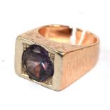 A gentleman's silver and gold ring set in alexandrite