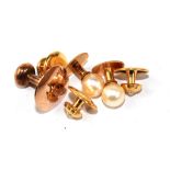 Two sets of gold studs