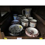 A set of six Greek pottery beakers and a jug, and three slipware ashtrays