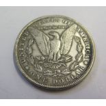 An American Morgan type dollar coin, dated 1892, 26.7g, possibly later