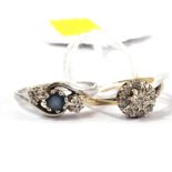 A diamond and sapphire cross over ring and a diamond cluster ring