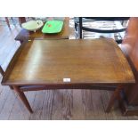 A vintage pair of teak grain rectangular coffee tables 81cm x 49cm