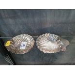 Two silver shell dishes