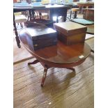 An oak dropleaf coffee table, the oval top on turned and block legs 105cm wide and another