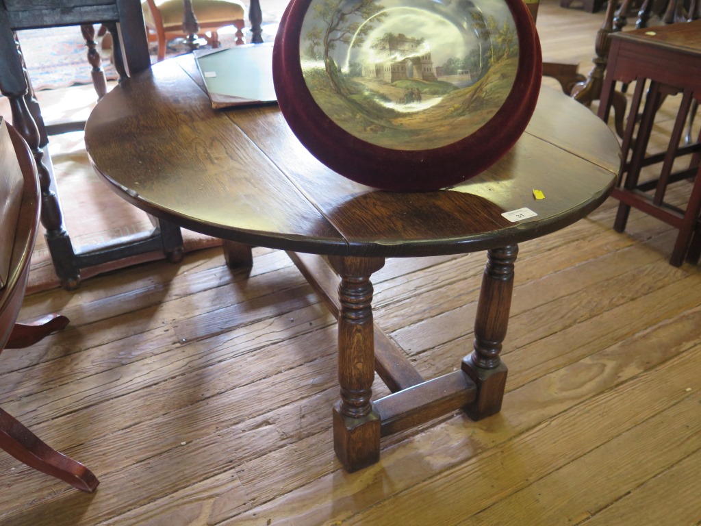 An oak dropleaf coffee table, the oval top on turned and block legs 105cm wide and another - Image 2 of 2