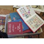 A Derwent stamp album of World stamps, two other albums, two stockbooks of British and World postage