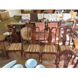 A set of four Queen Anne style dining chairs, the vase shape splats with patera inlay over