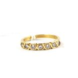 A seven stone diamond ring set in 18 carat gold