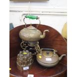 A Victorian copper jelly mould, stamped 368, 13cm diameter, a brass kettle and another on stand (3)