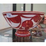 An Aldermaston Pottery red lustre bowl, with stylized fruit design, monogrammed for Alan Caiger-