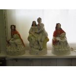 Two Victorian Staffordshire figures of Little Red Riding Hood, 31cm high and another figure of a