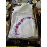 Two boxes of table linen, some with floral embroidering, also some lace