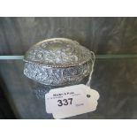 A heart shaped silver trinket box decorated in relief, Chester 1895