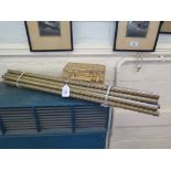 A set of fourteen brass rope twist stair rods with fittings for twelve rods, 69cm long