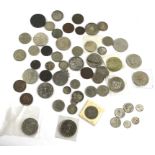 A collection of silver and copper coins