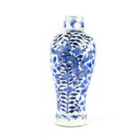 A Chinese blue and white baluster form vase, depicting dragons amongst flowers, unmarked 25.5cm