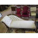 An Edwardian stained beech chaise longue, the scrolling button upholstered back on ring turned