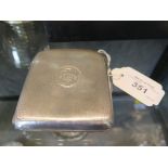 A silver cigarette case