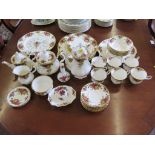 A Royal Albert Old Country Roses pattern part breakfast service, including clock, teapot, coffee pot