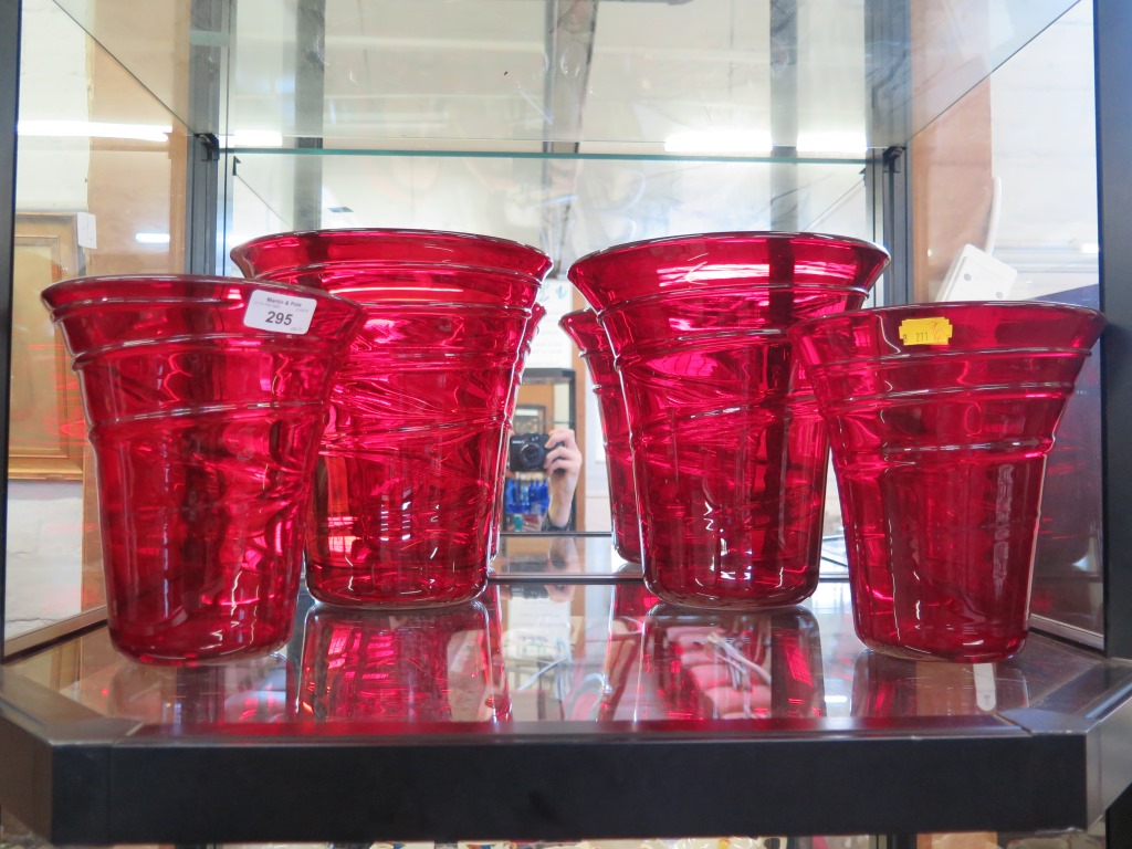 A large pair of Whitefriars red glass ribbon trail vases 27.5cm high, and another pair similar