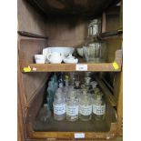 Various apothecary's chemical jars, other bottles, measuring spoons and vessels