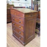 A Regency rosewood Davenport, the sliding leather inset hinged slope over a pen drawer, slide and