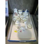 Coalport miniature collection comprising eleven pieces jugs, kettle, teapot, bowl, mug, candle