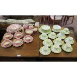 An Edwardian green banded tea service, with urn and husk swags (35 pieces), and a Wedgwood Ferrara