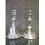 A pair of silver candlesticks,16.5cm tall, London 1961