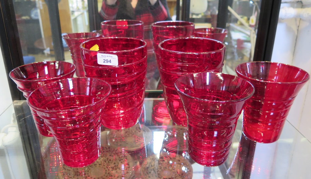 A pair of Whitefriars red glass ribbon trail vases 13cm high, and two other pairs, similar, 14cm and