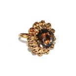 A 9 carat ring set with large citrine?