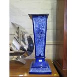 A Doulton Burslem blue relief jardiniere stand, with later top, of tapering square form with foliate