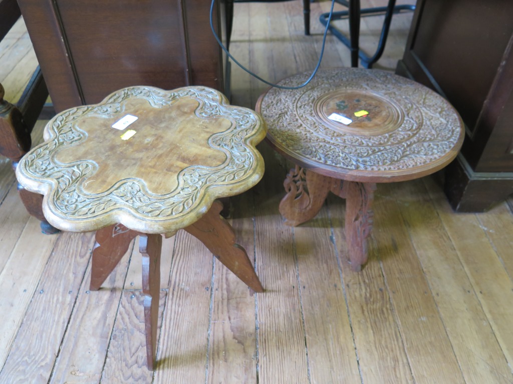 An Indian carved wood circular low table with brass inlay 37cm diameter, 32cm high and another