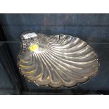 A silver dish in the form of a shell having pierced decoration, Sheffield 1906