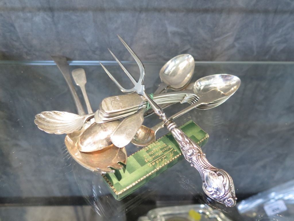 A small collection of silver cutlery to include six Victorian silver tea spoons