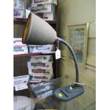 An industrial desk lamp in original condition