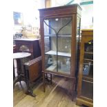 An Edwardian boxwood strung display cabinet, with glazed door and sides on square legs 59cm wide