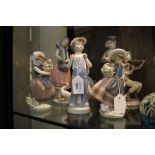 Six Lladro figures including 5856 Clowns playing horn and violins, 5466 girl by a telephone and