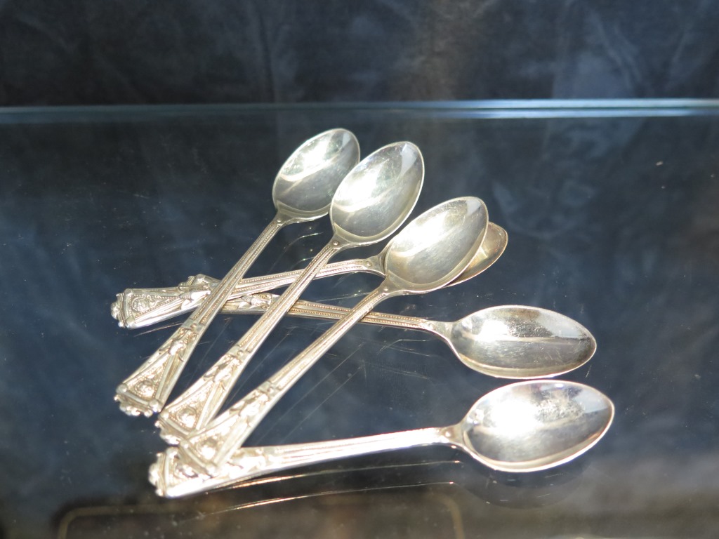 A set of six silver coffee spoons