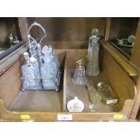 A four bottle cruet and four scent bottles