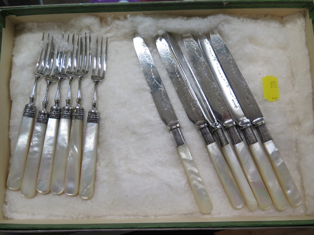 A set of six knives and forks, silver collars and silver forks