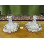 A pair of Regency stepped glass ship's decanters with stoppers, 18cm high, on William IV style