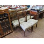 A set of five Italian stained beech dining chairs, with cross frame mid rails, stuffover seats,