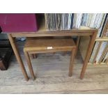 Three teak occasional tables