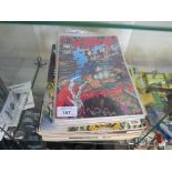 A collection of comics incliding a Violater comic signed by Alan Moore, Marvel Spiderman comics, and